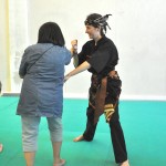 Pencak Silat - Mathilde en pleine technique - maison du Taiji